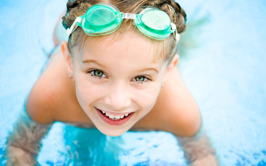 Little girl in swimming pool